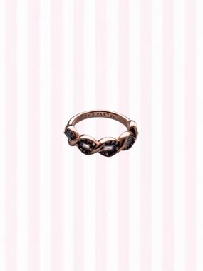 Rose Gold Twisted Band Ring with Baby Blue Stones